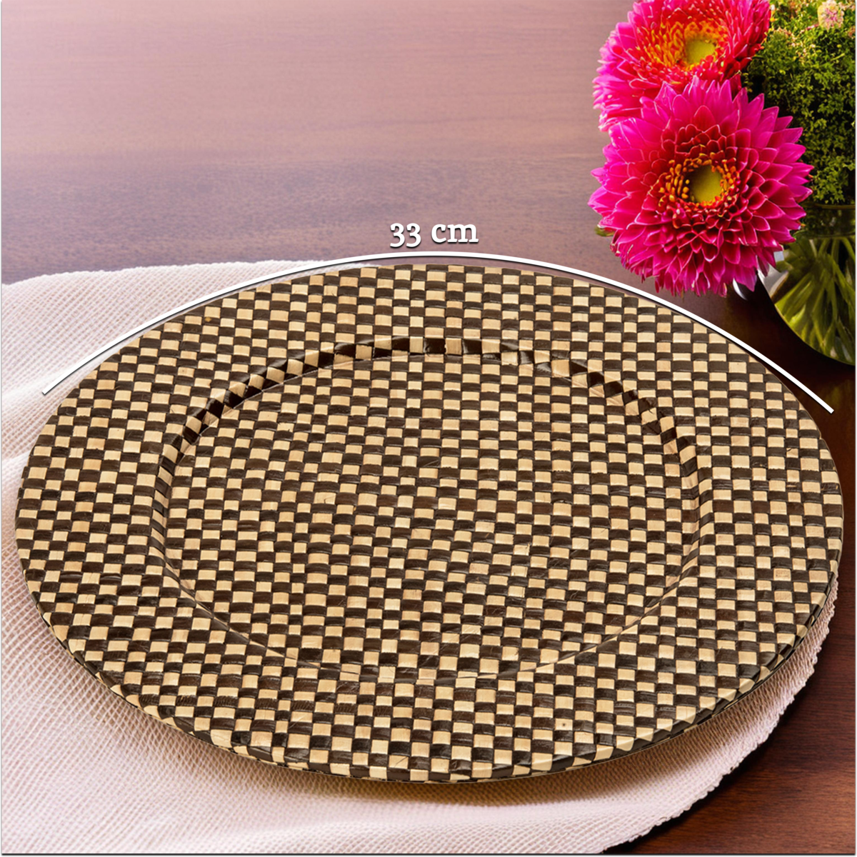 Black and natural woven charger plate styled on a dining table