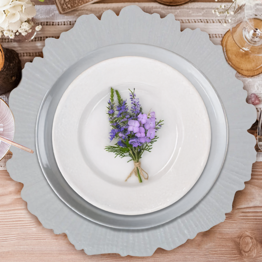 White reef charger plate shown from above with irregular edge