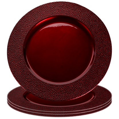 Red pebble effect charger plate styled on a dining table
