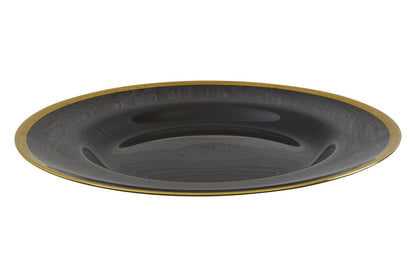 Black glass charger plates arranged together showing the matching set