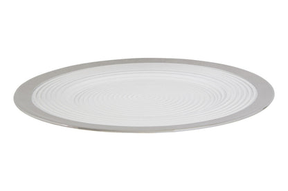 Close-up detail of the silver rim on a glass charger plate