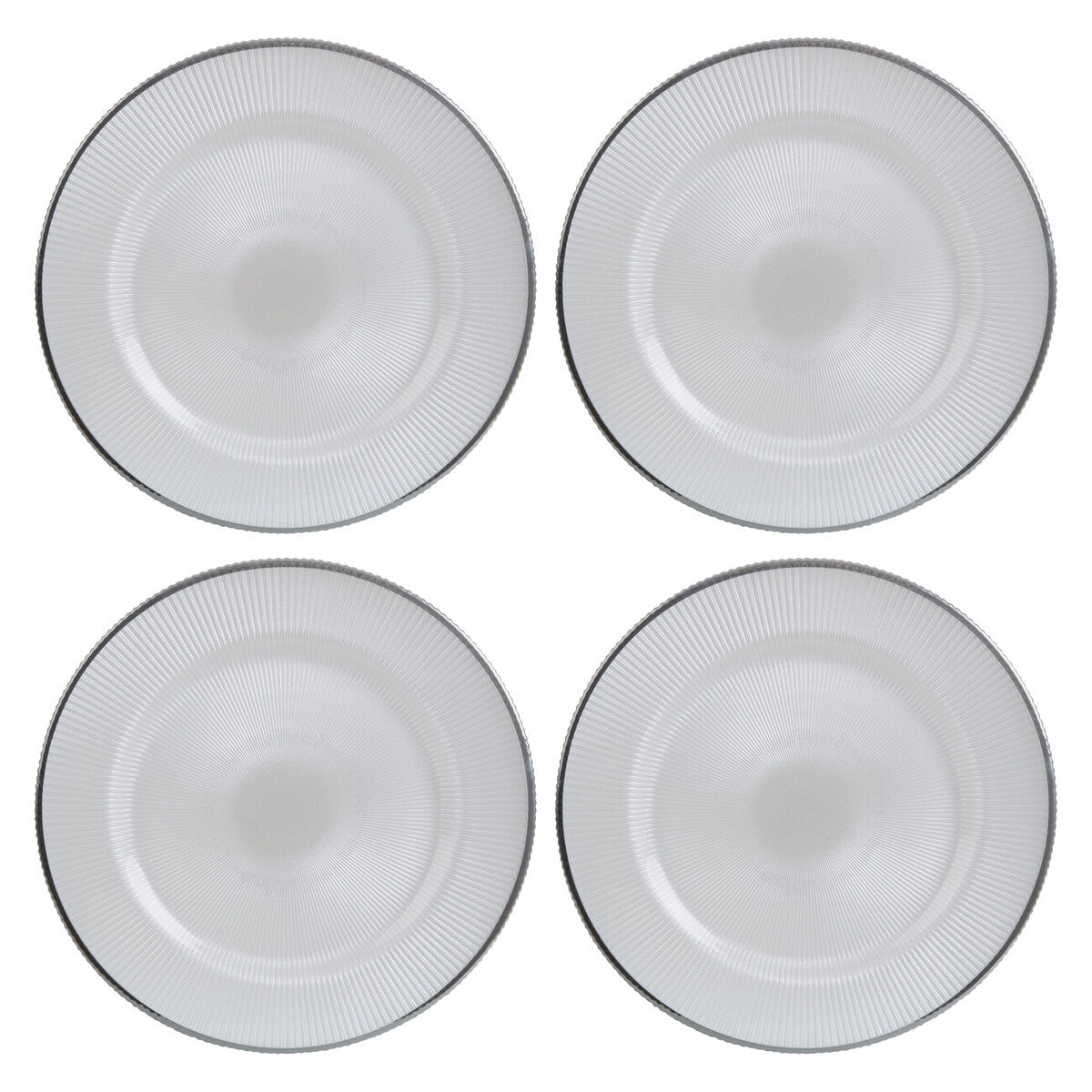 White glass charger plates stacked showing the embossed texture
