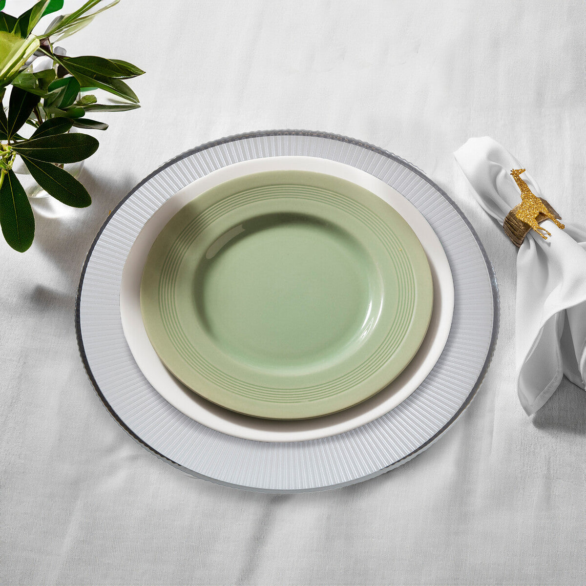 White glass charger plate shown from above with ribbed texture visible