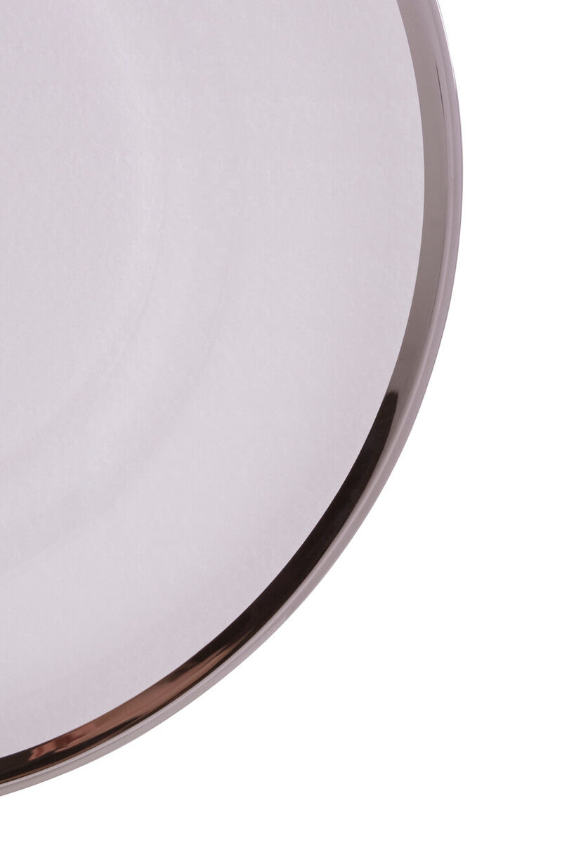 Close-up detail of the silver rim on a glass charger plate
