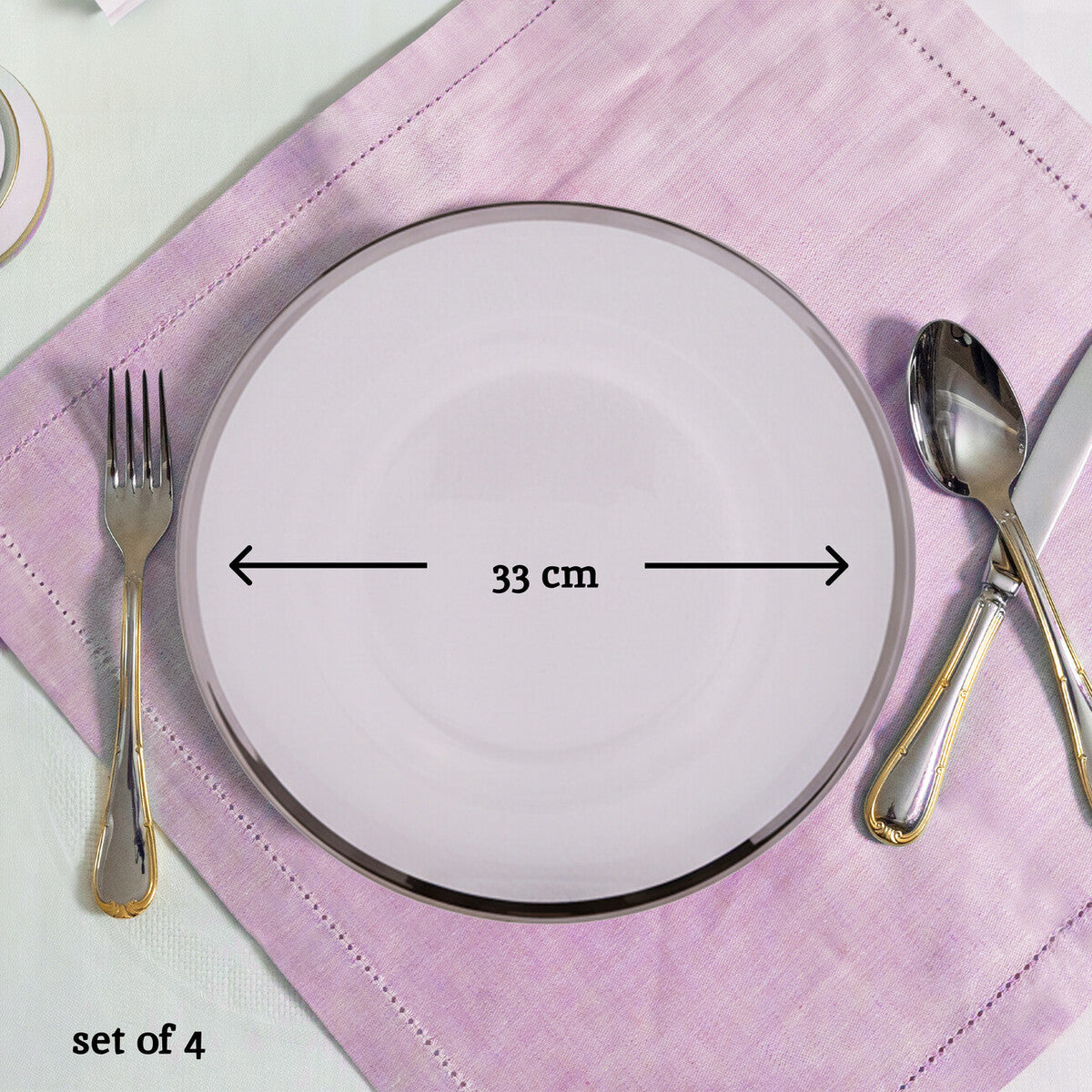 Glass charger plates arranged together showing the matching set
