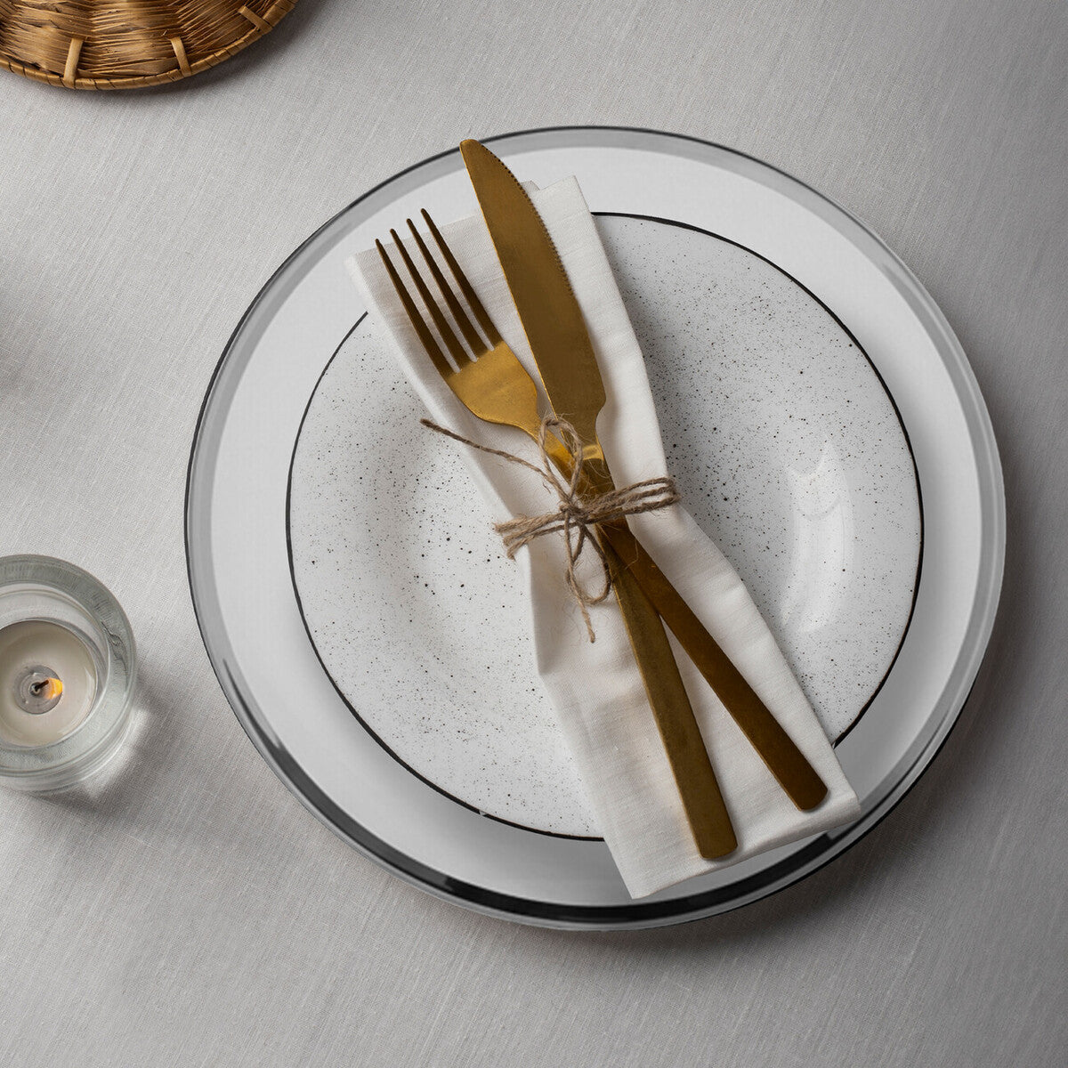 Set of four plain glass charger plates with silver rims, 33cm