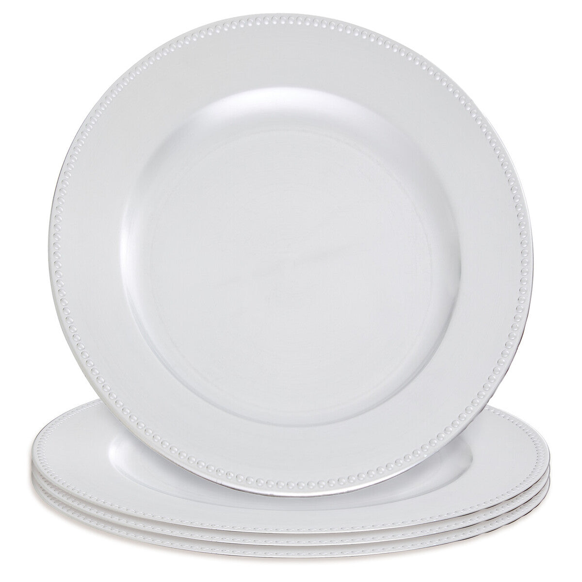 Silver charger plate laid beneath a dinner plate in a table setting