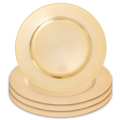 Gold charger plate styled with tableware for a formal dinner setting