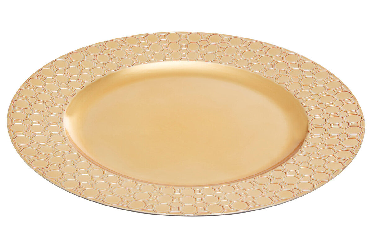 Gold charger plates styled with tableware for a formal dinner