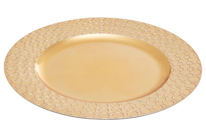 Gold charger plates styled with tableware for a formal dinner