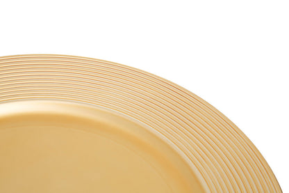 Gold charger plates styled with tableware for a formal dinner