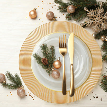 Gold charger plates stacked showing the ribbed rim texture