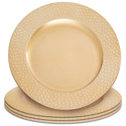 Gold charger plates arranged together showing the matching set