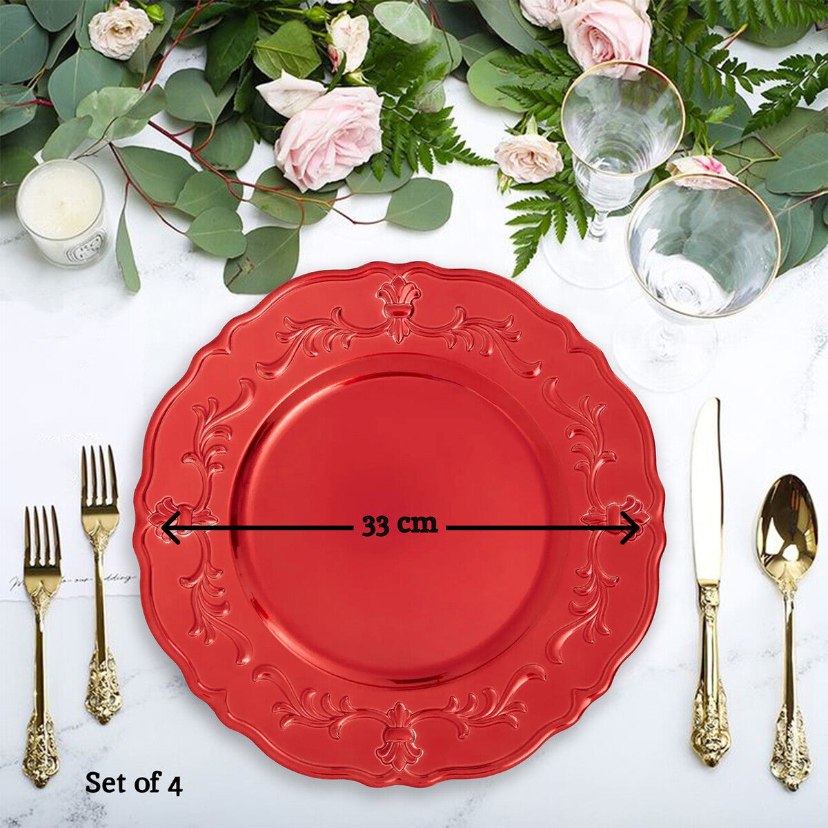 Red baroque charger plates arranged together showing the matching set