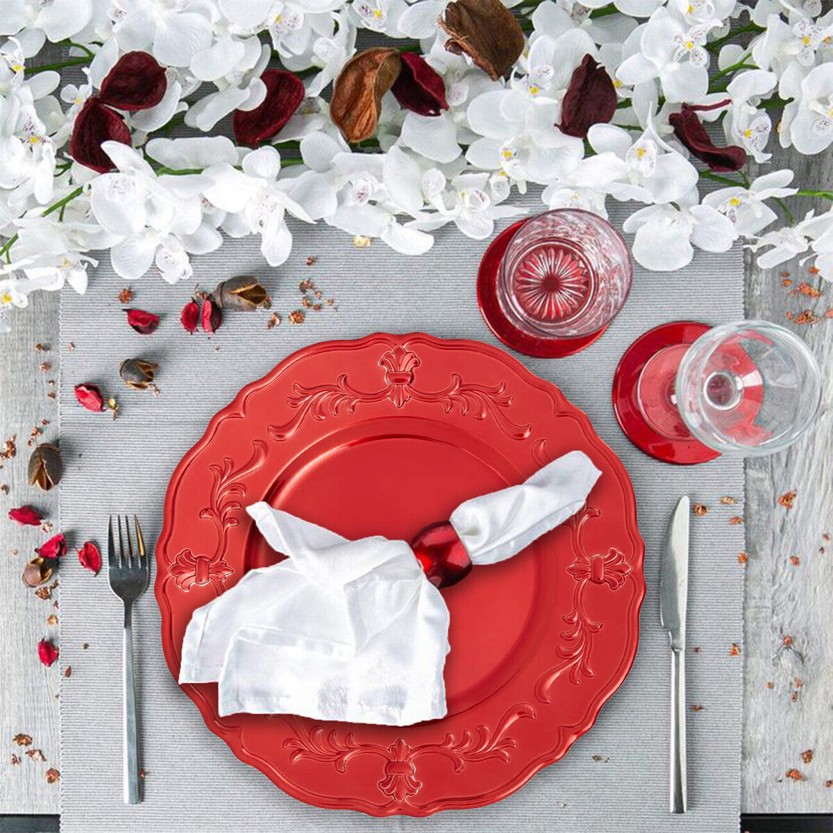 Red baroque charger plate shown from above with scalloped rim visible