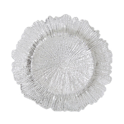Silver reef charger plate laid beneath a dinner plate in a place setting