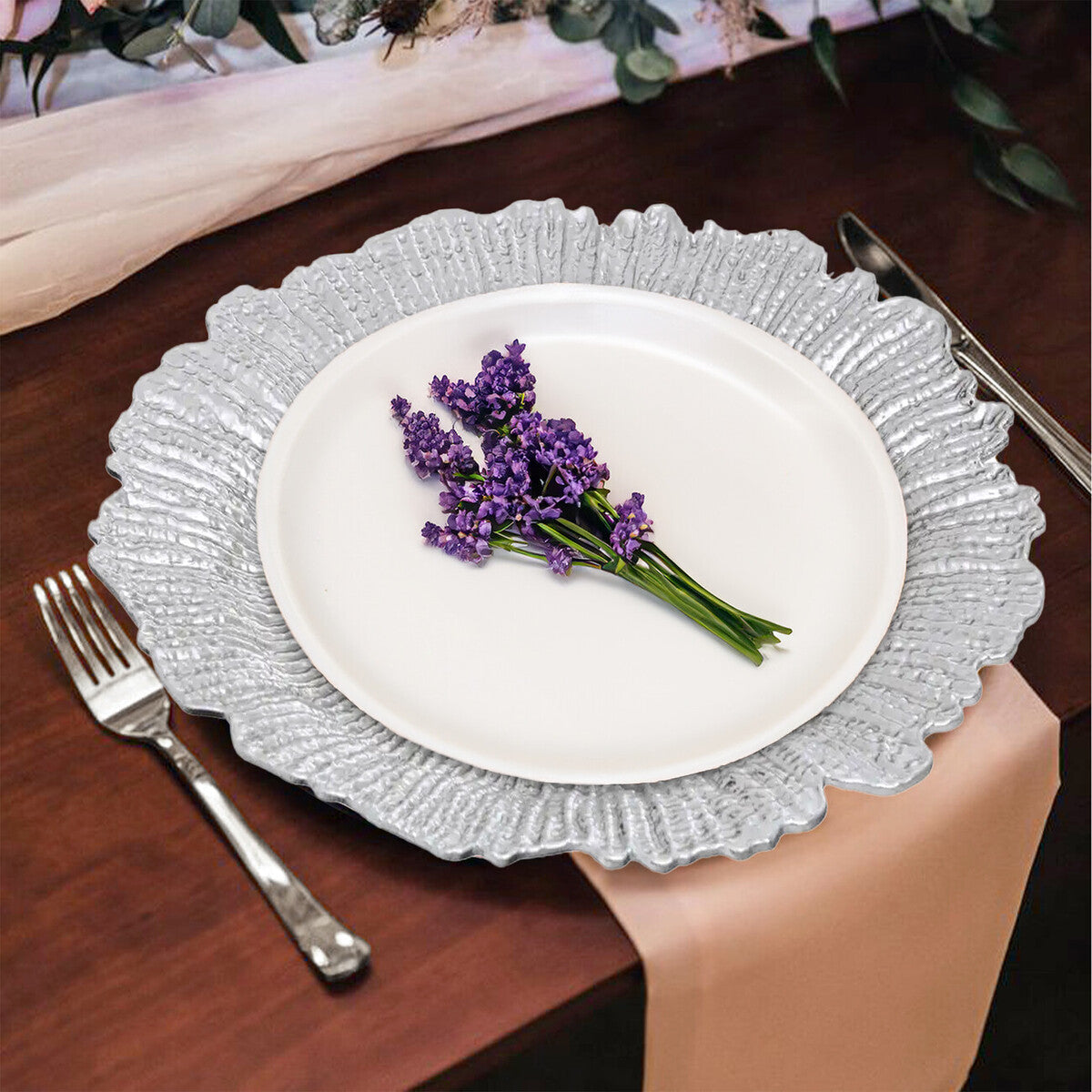 Silver reef charger plates stacked showing the textured rim