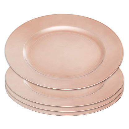 Rose gold charger plates styled with tableware for a formal dinner