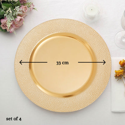 Gold charger plates arranged together showing the matching set
