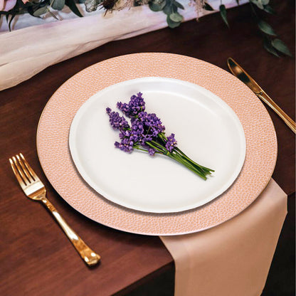 Rose gold charger plates stacked showing the pebble-effect texture