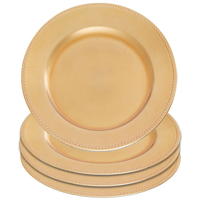 Gold charger plates styled with tableware for a formal dinner