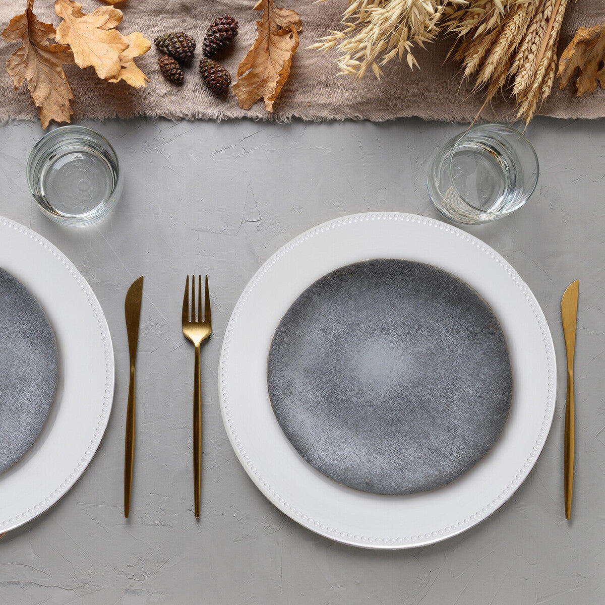 Silver dotted charger plate shown from above