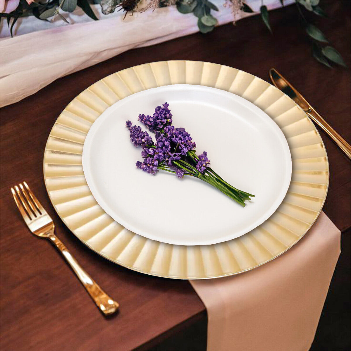Gold wave charger plates stacked showing the fluted rim