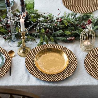 Black and natural woven charger plate shown from above