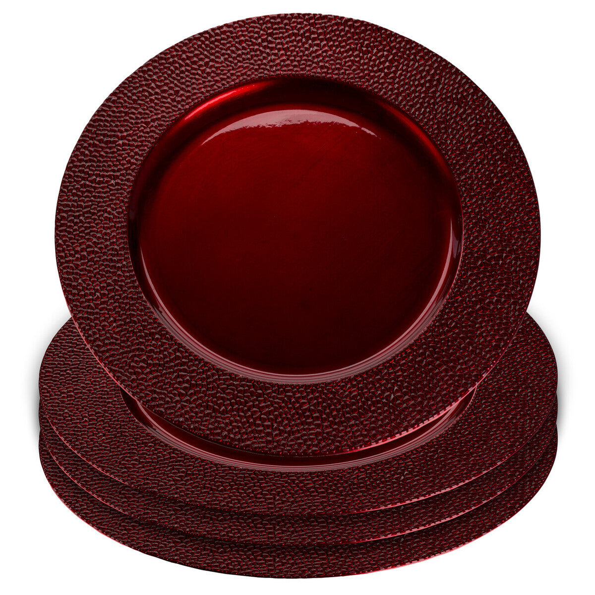 Red charger plates styled with tableware for a festive dinner