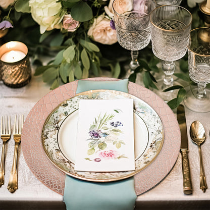 Rose gold charger plates stacked showing the crocodile-effect texture