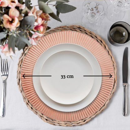 Rose gold charger plates arranged together showing the matching set