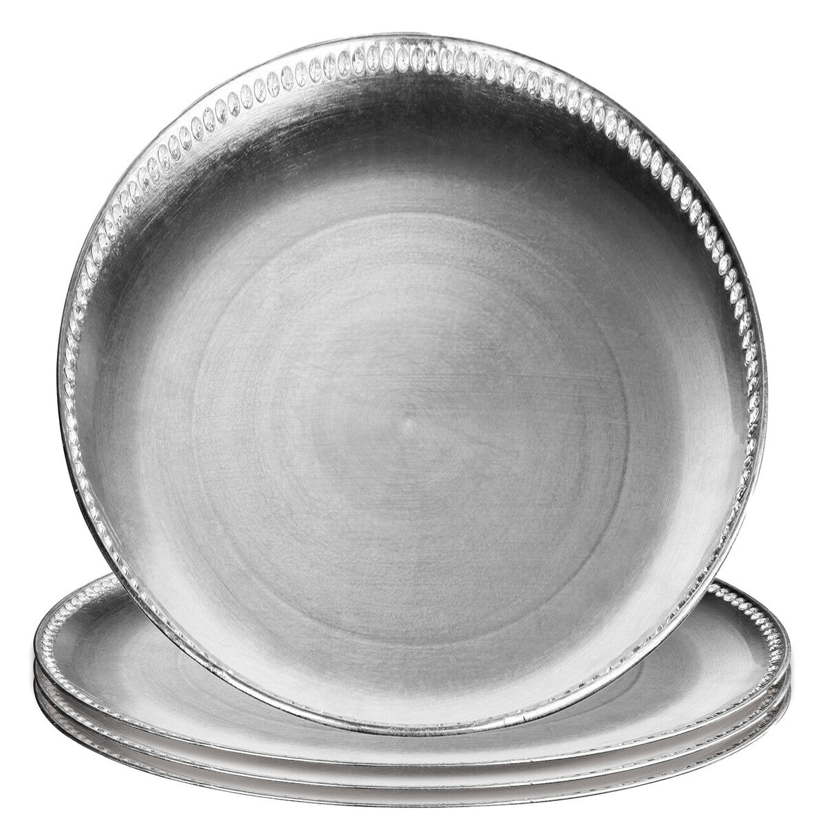 Silver charger plates styled with tableware for a formal dinner