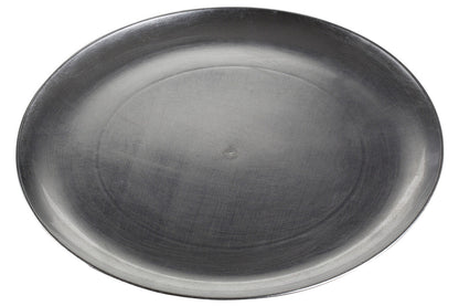 Silver coupe charger plate laid beneath a dinner plate in a place setting