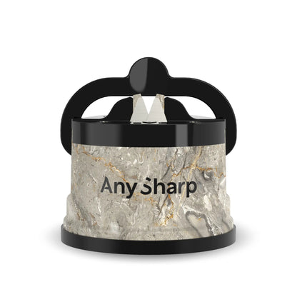 Marble-patterned sharpener with black handle on a white background