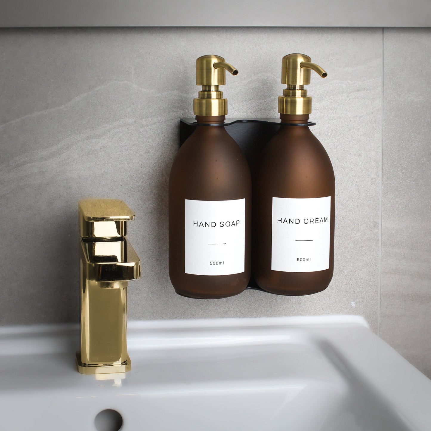 Namie Matte Black Wall Mounted Dispenser Bracket Set with Frosted Amber Glass Bottles