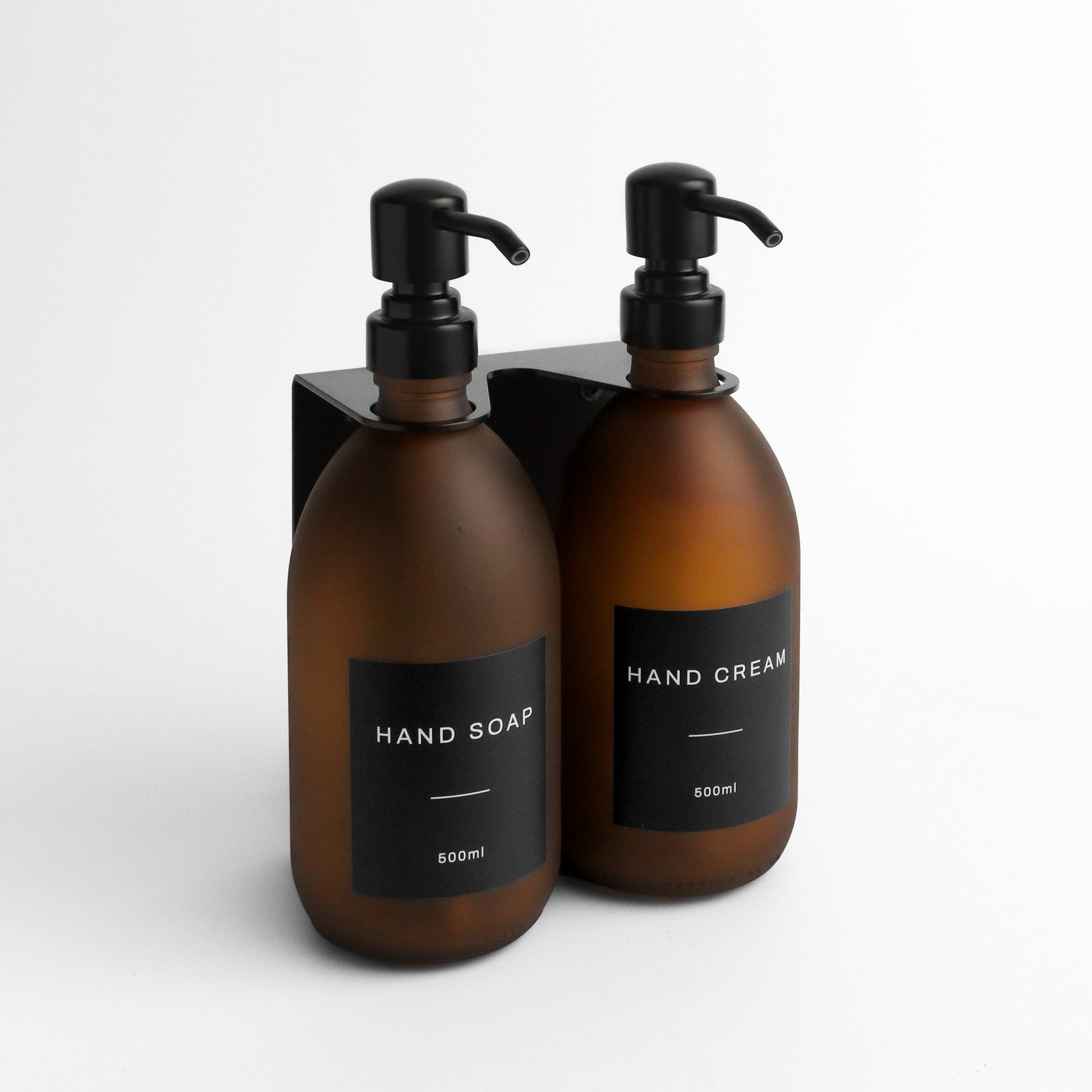 Namie Matte Black Wall Mounted Dispenser Bracket Set with Frosted Amber Glass Bottles