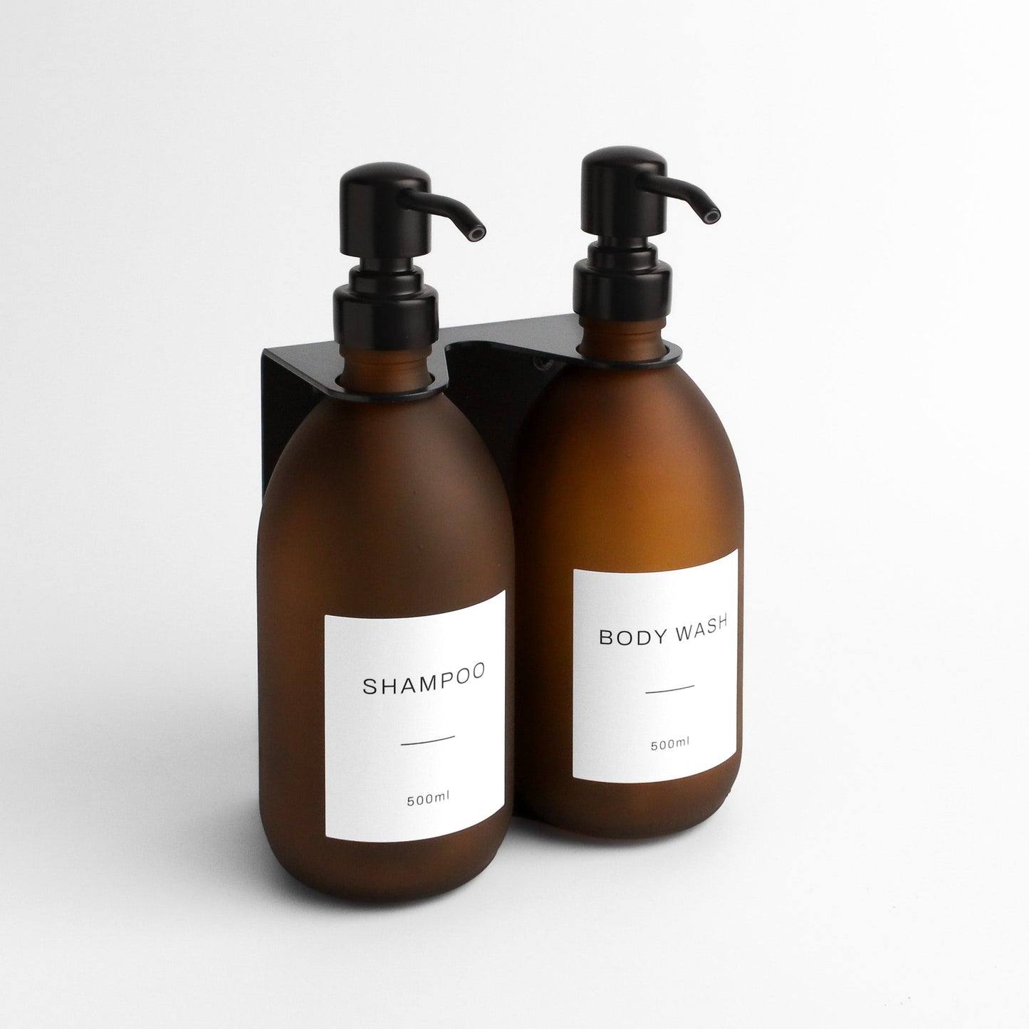 Namie Matte Black Wall Mounted Dispenser Bracket Set with Frosted Amber Glass Bottles