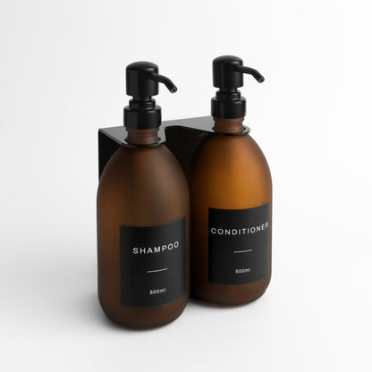 Namie Matte Black Wall Mounted Dispenser Bracket Set with Frosted Amber Glass Bottles