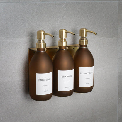 Namie Gold Wall Mounted Dispenser Bracket Set with Frosted Amber Glass Bottles