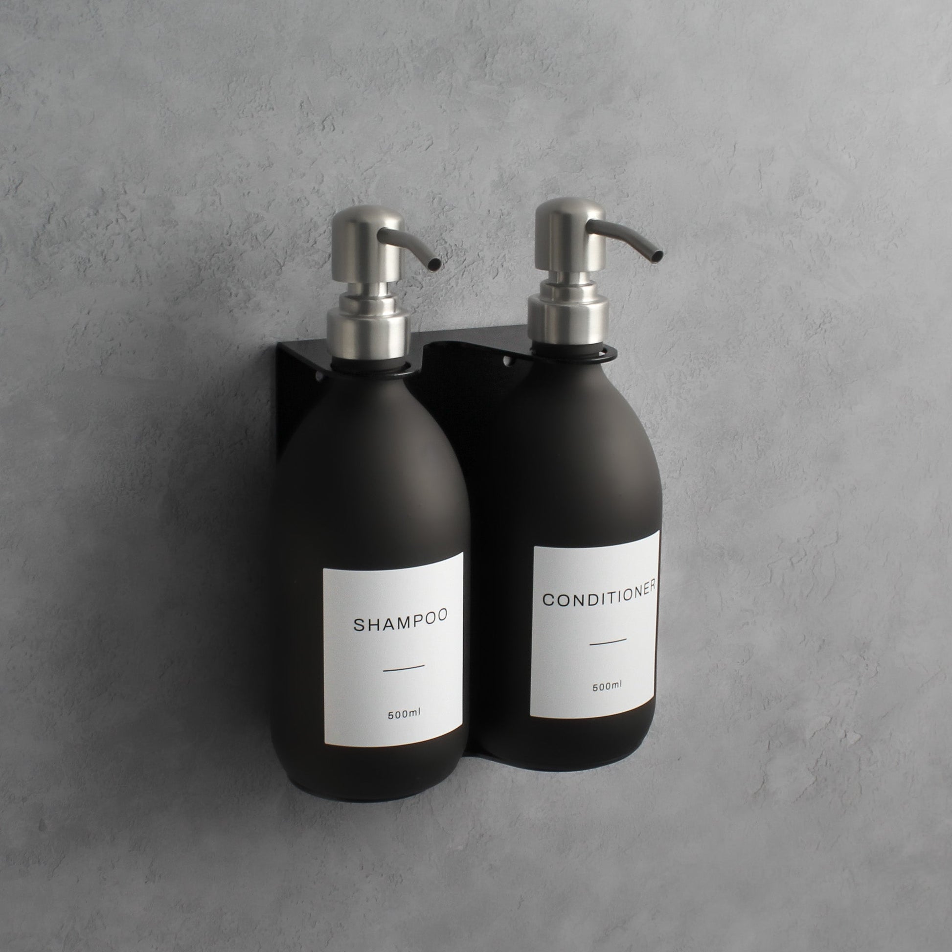 Namie Matte Black Wall Mounted Dispenser Bracket Set with Matte Black Bottles