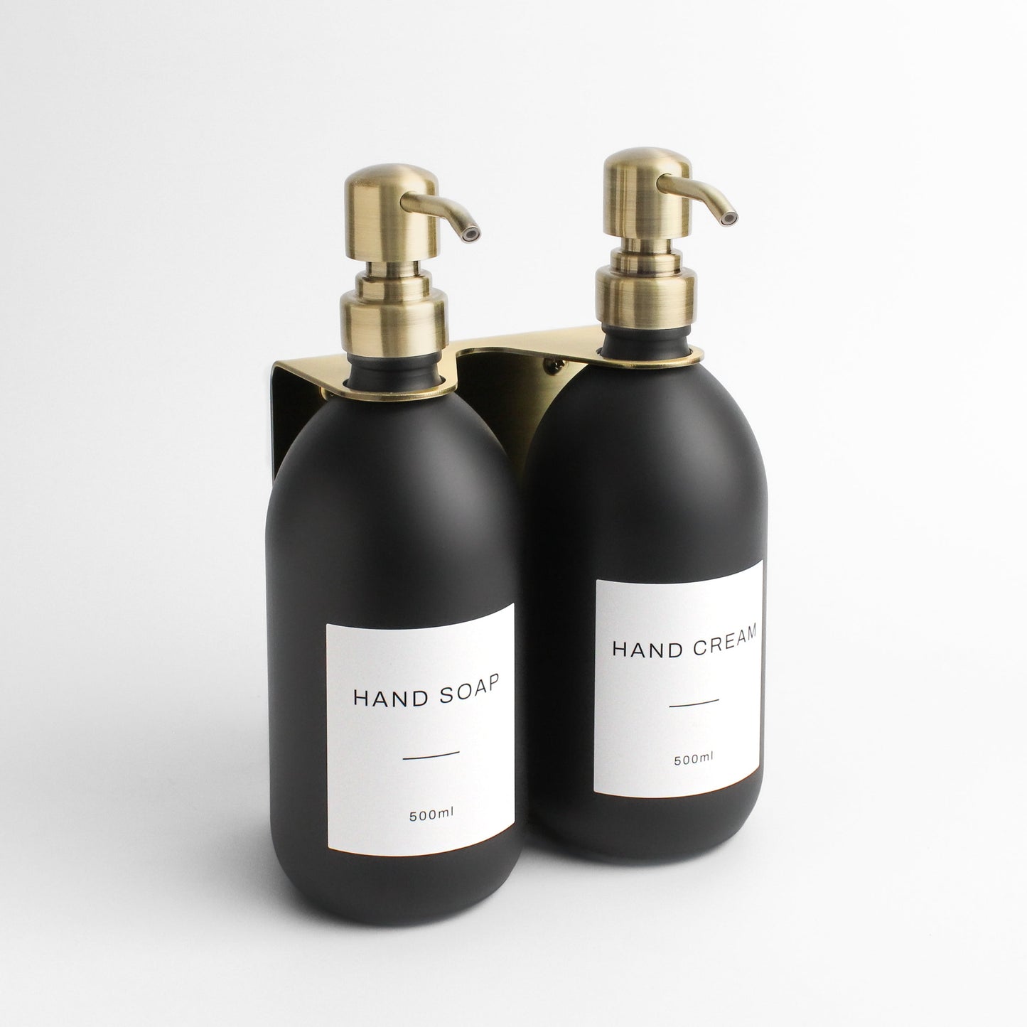 Namie Gold Wall Bracket & Matte Black Dispenser Set