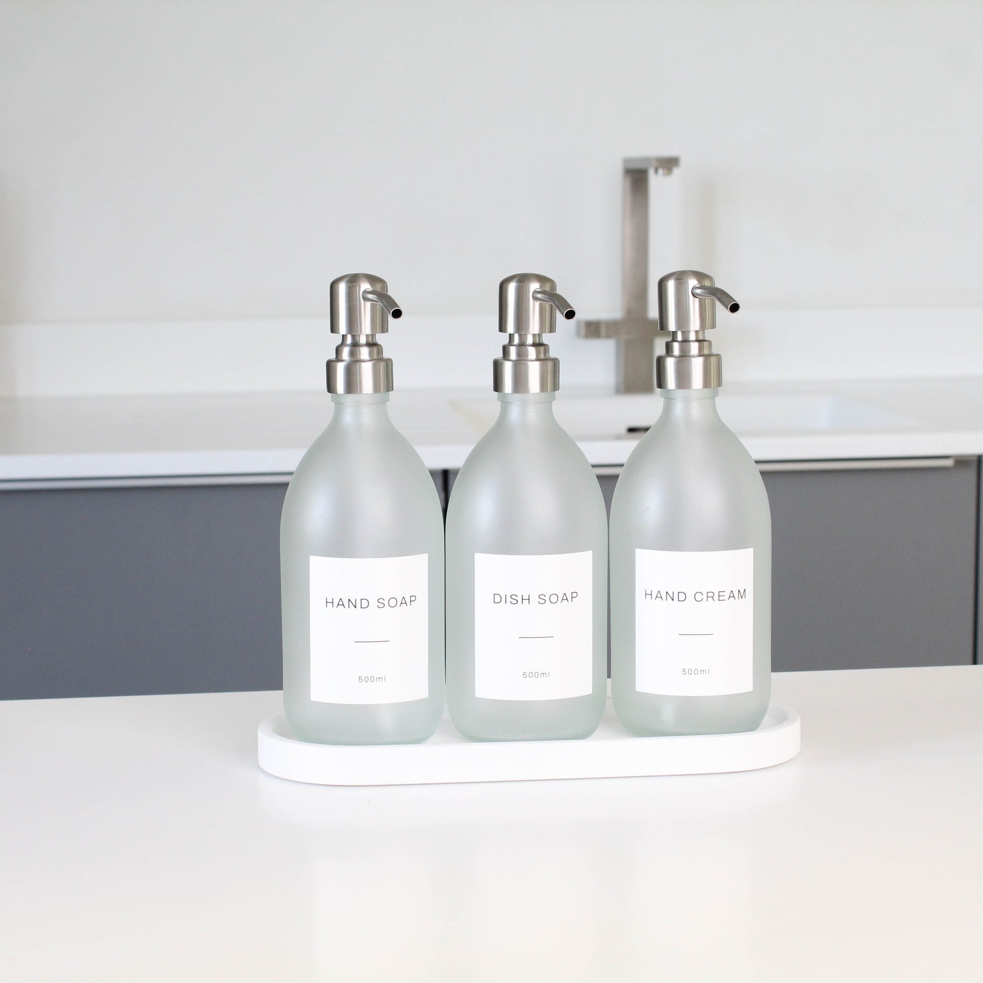 Namie Frosted White Glass Soap Dispenser Triple Set with White Concrete Tray