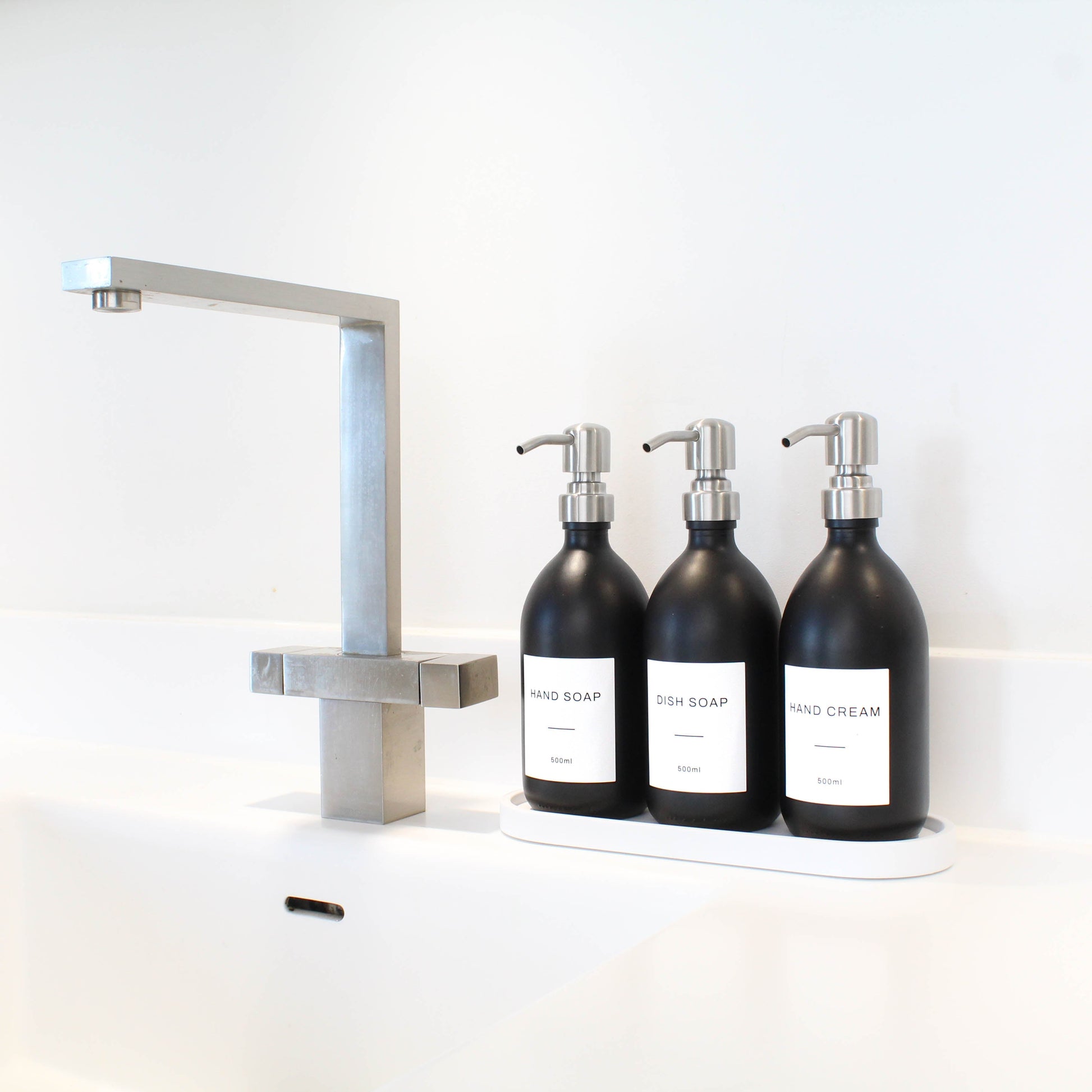 Namie Matte Black Glass Soap Dispenser Triple Set with White Concrete Tray