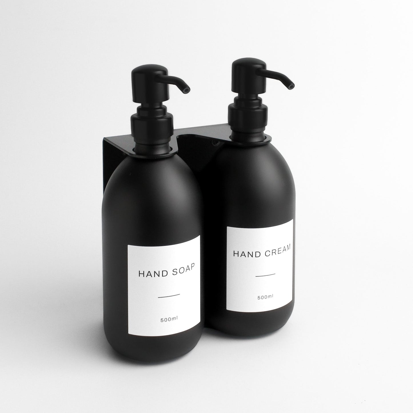 Namie Matte Black Wall Mounted Dispenser Bracket Set with Matte Black Bottles
