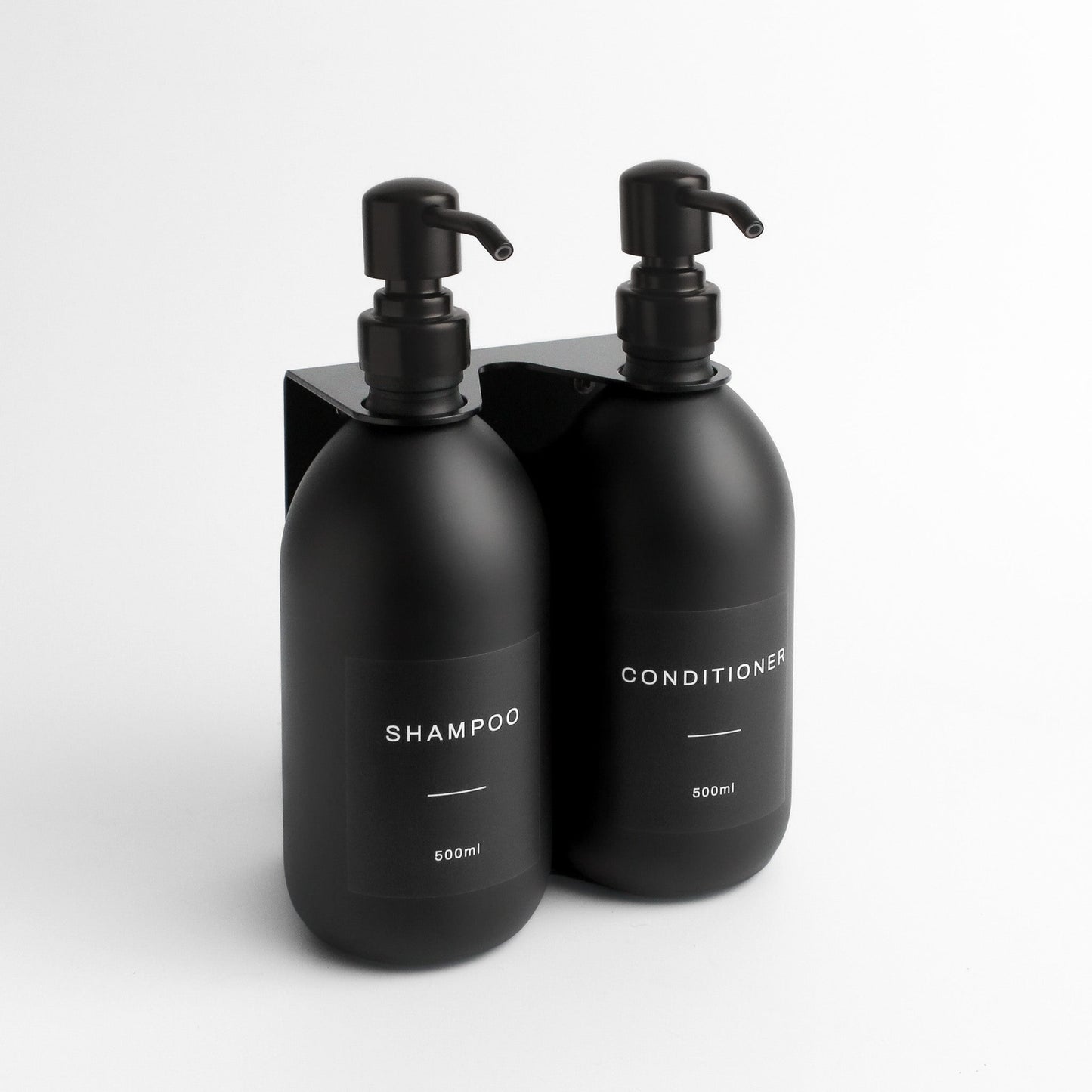 Namie Matte Black Wall Mounted Dispenser Bracket Set with Matte Black Bottles