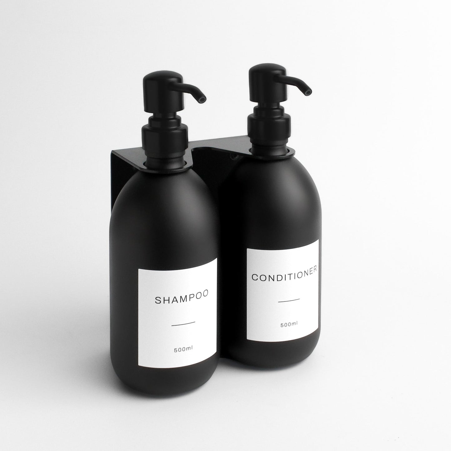Namie Matte Black Wall Mounted Dispenser Bracket Set with Matte Black Bottles