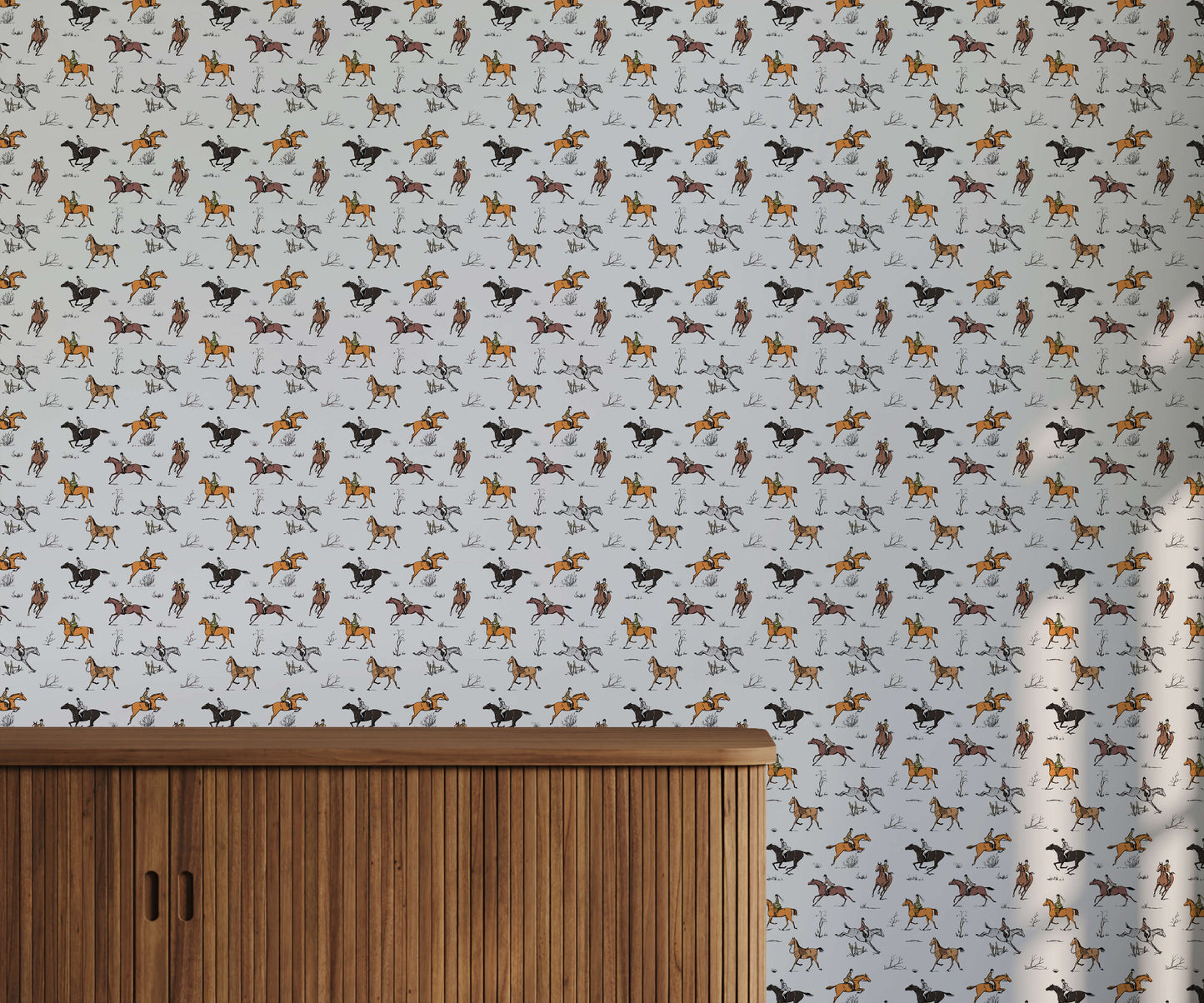 Wallpaper with dog pattern on a light gray background, featuring a wooden cabinet below.