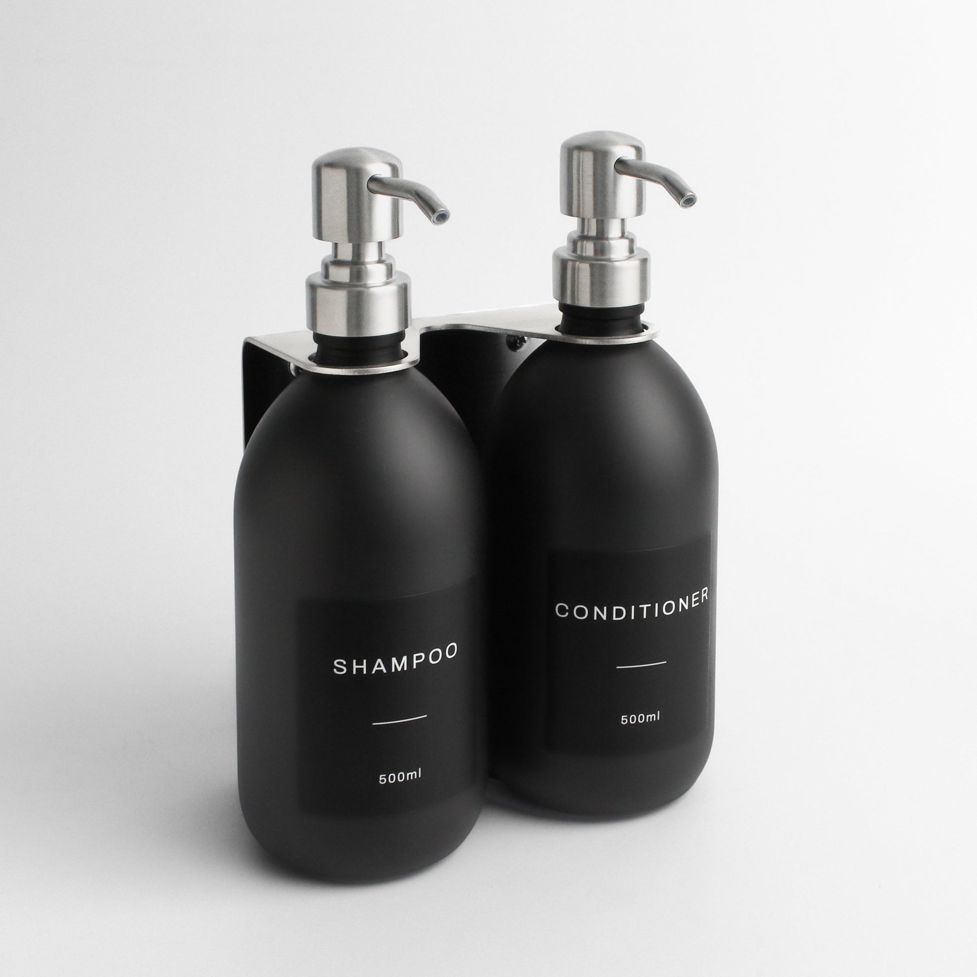 Namie Silver Wall Mounted Dispenser Bracket Set with Matte Black Bottles