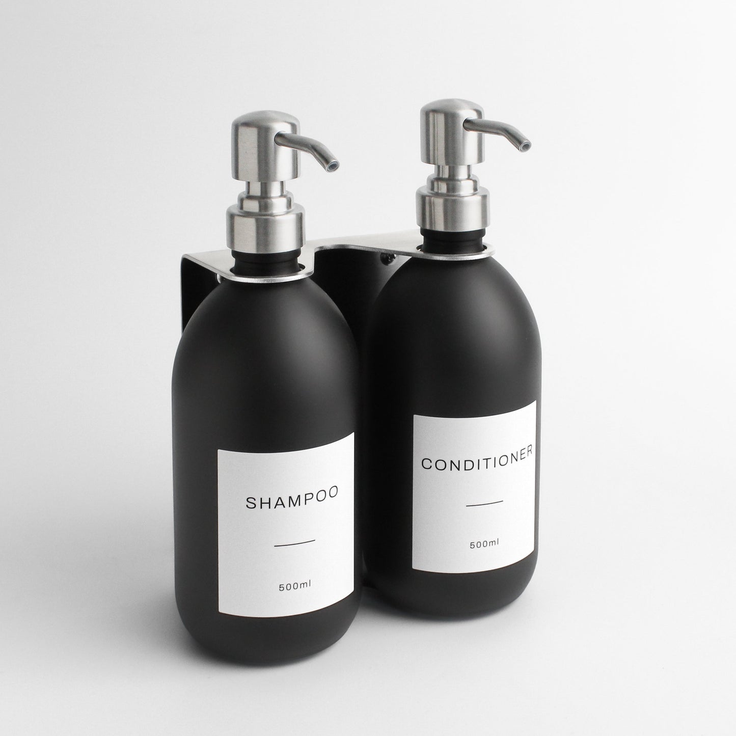 Namie Silver Wall Mounted Dispenser Bracket Set with Matte Black Bottles