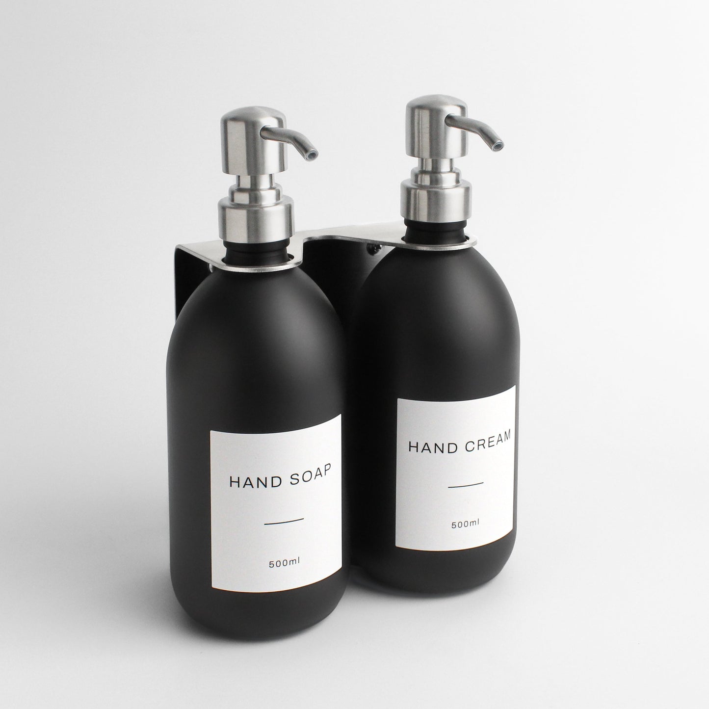 Namie Silver Wall Mounted Dispenser Bracket Set with Matte Black Bottles